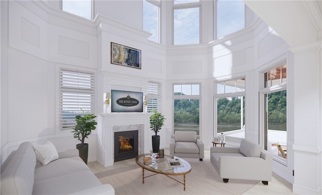 85 1st St, Oakmont, PA 15139 - living room with a high ceiling, healthy amount of natural light, and a premium fireplace
