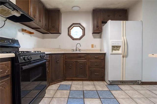 151 Cove Run Rd, Bradys Bend Twp, PA 16028 - kitchen with black gas range, white fridge with ice dispenser, range hood, light countertops, and dark brown cabinets