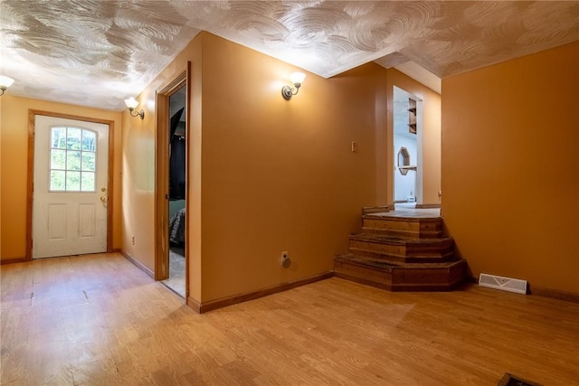 151 Cove Run Rd, Bradys Bend Twp, PA 16028 - foyer entrance featuring light wood finished floors and baseboards