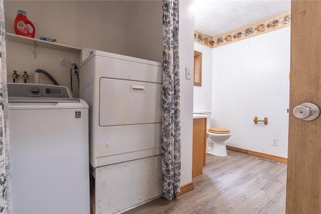 151 Cove Run Rd, Bradys Bend Twp, PA 16028 - laundry area featuring wood finished floors and separate washer and dryer