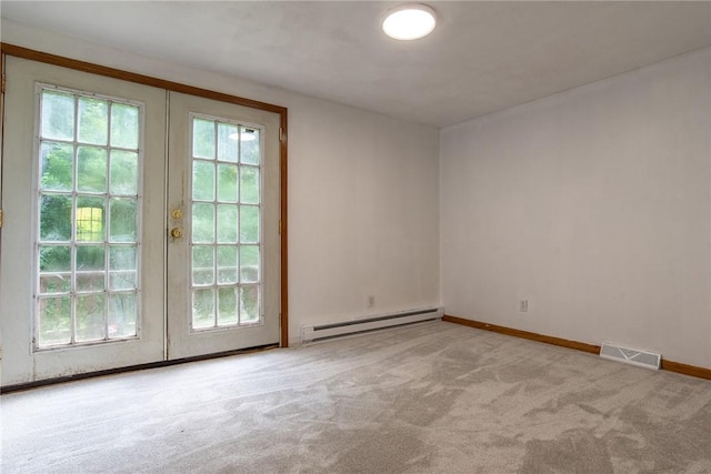 151 Cove Run Rd, Bradys Bend Twp, PA 16028 - empty room featuring french doors, baseboard heating, and carpet floors