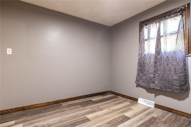 151 Cove Run Rd, Bradys Bend Twp, PA 16028 - spare room featuring baseboards and wood finished floors