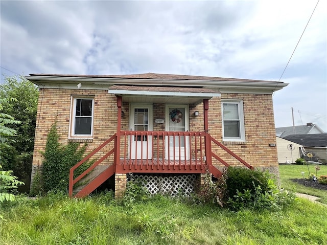 7351/2 7th Ave, Coraopolis, PA 15108 - view of front facade with brick siding and a porch