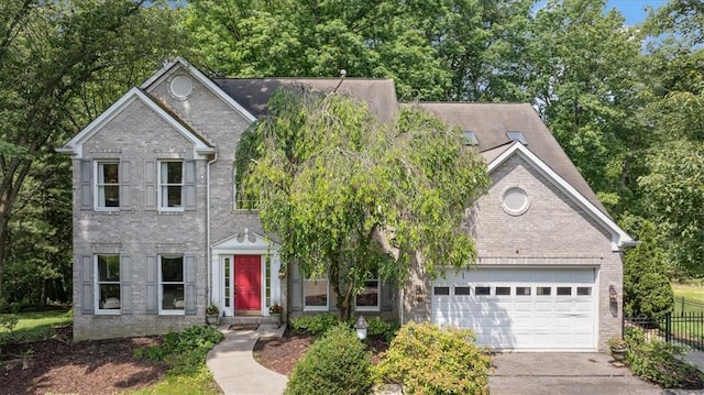 2001 Buckingham Dr, Marshall, PA 16046 - view of front of home featuring brick siding, concrete driveway, and a garage