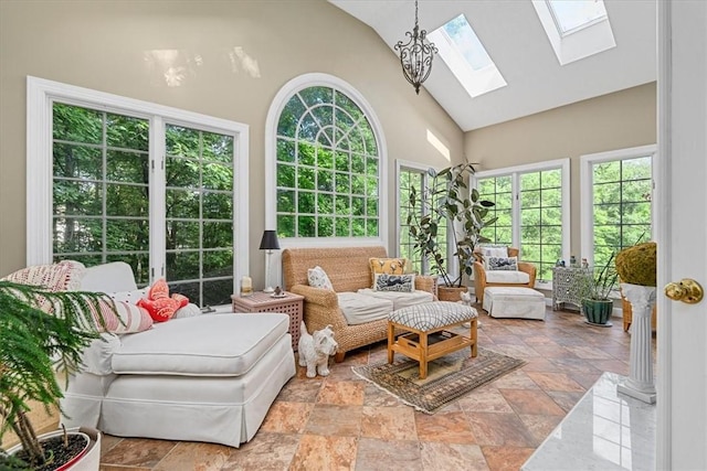 2001 Buckingham Dr, Marshall, PA 16046 - sunroom featuring a skylight, plenty of natural light, high vaulted ceiling, and stone tile flooring