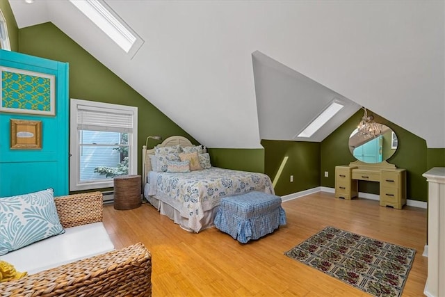 2001 Buckingham Dr, Marshall, PA 16046 - bedroom featuring a skylight, wood finished floors, and lofted ceiling