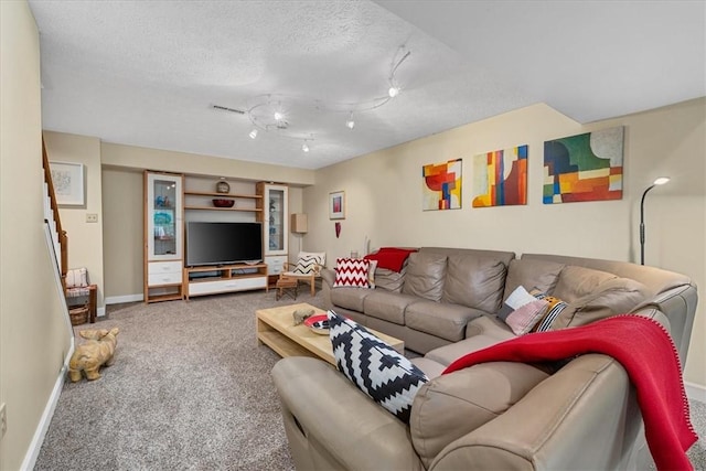 2001 Buckingham Dr, Marshall, PA 16046 - carpeted living room featuring a textured ceiling and track lighting