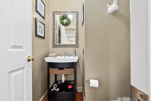 2001 Buckingham Dr, Marshall, PA 16046 - half bathroom with a sink and baseboards