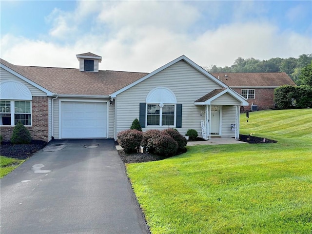 195 Rural Ave, South Strabane, PA 15301 - view of front facade featuring a garage, asphalt driveway, a front yard, brick siding, and a shingled roof