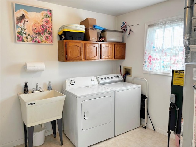 195 Rural Ave, South Strabane, PA 15301 - laundry area with washing machine and dryer, cabinet space, and gas water heater