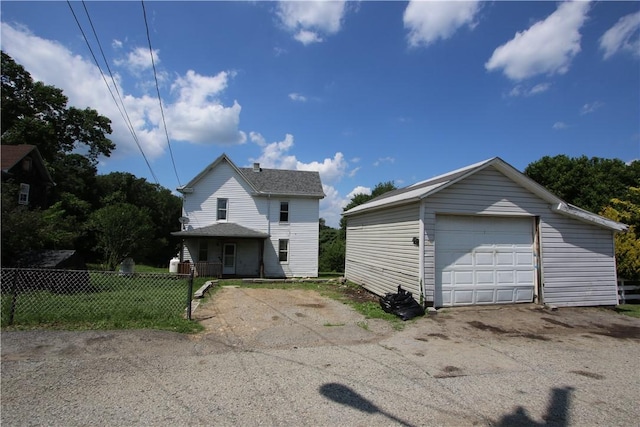 431 1st Ave, Luzerne Twp, PA 15413 - view of front of home with an outbuilding, a garage, and asphalt driveway