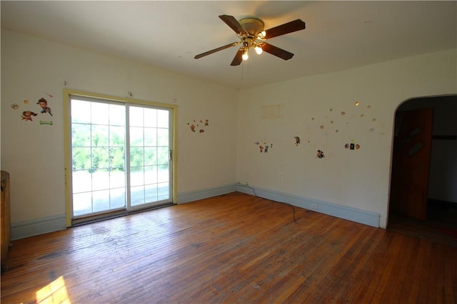 431 1st Ave, Luzerne Twp, PA 15413 - spare room featuring hardwood / wood-style floors, a ceiling fan, and arched walkways