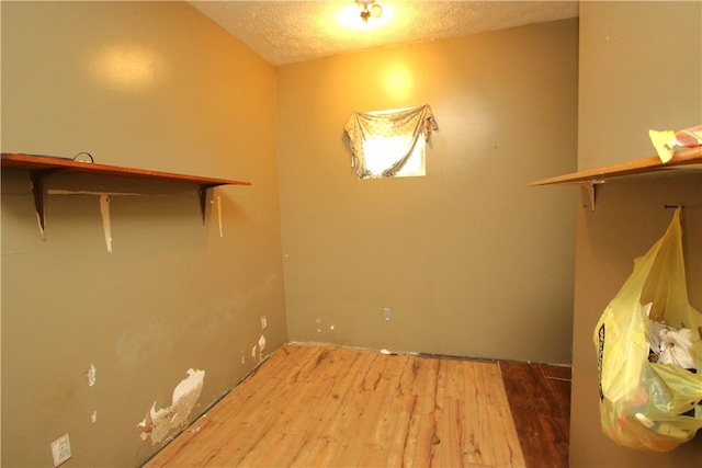 431 1st Ave, Luzerne Twp, PA 15413 - washroom featuring wood finished floors and a textured ceiling