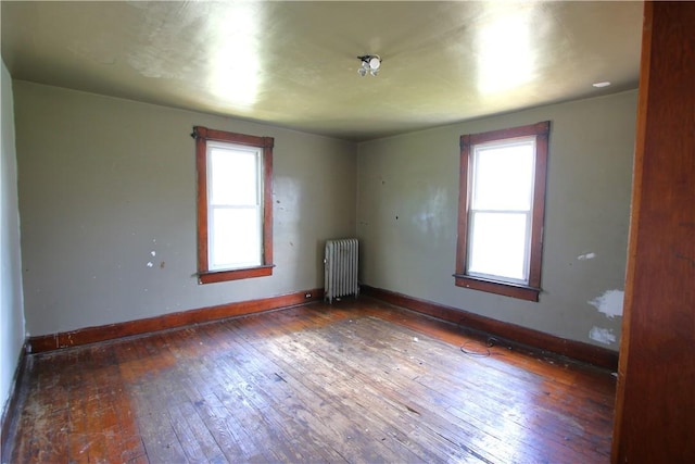 431 1st Ave, Luzerne Twp, PA 15413 - unfurnished room with hardwood / wood-style flooring and radiator heating unit