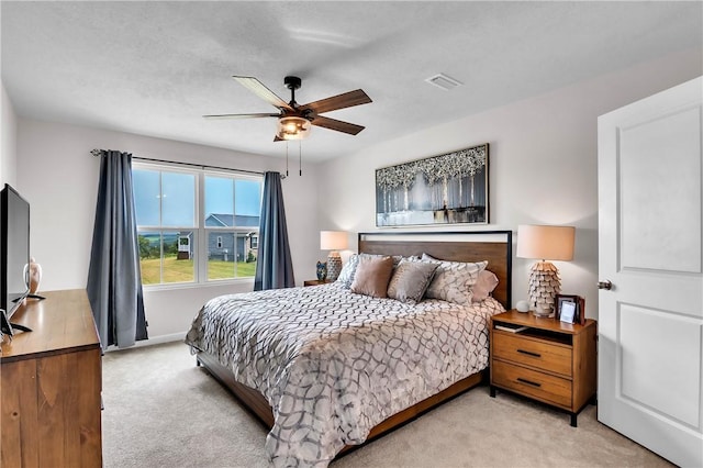 238 Smith Ln, Chippewa Twp, PA 15010 - bedroom with light colored carpet and a ceiling fan