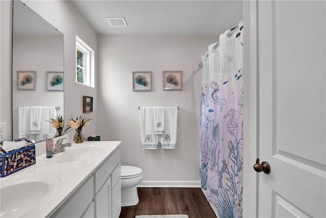 238 Smith Ln, Chippewa Twp, PA 15010 - full bath featuring double vanity, wood finished floors, and a shower with curtain
