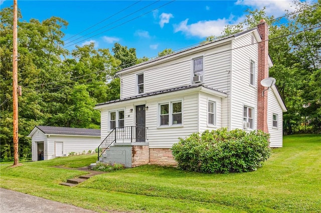 136 B St, Shade Twp, PA 15563 - view of front of property featuring a chimney and a front yard