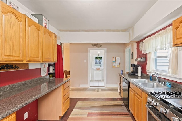 136 B St, Shade Twp, PA 15563 - kitchen with stainless steel gas stove and dishwashing machine