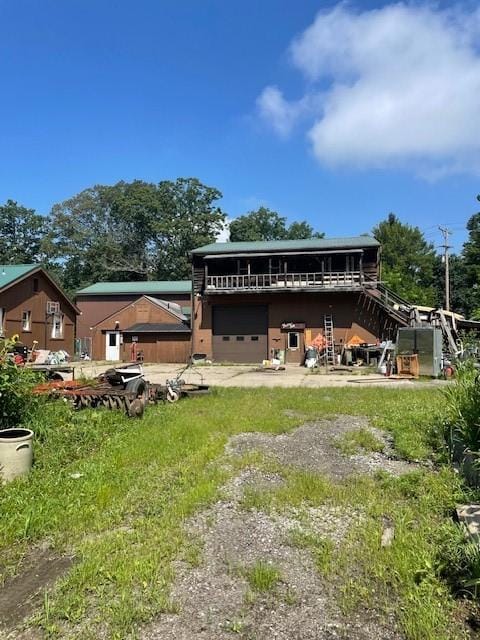 515 Steiner Bridge Rd, Middlesex Twp, PA 16059 - rear view of house featuring a garage and driveway
