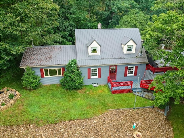 1405 Three Degree Rd, Adams Twp, PA 16059 - cape cod home featuring a metal roof, a front lawn, a deck, and a view of trees