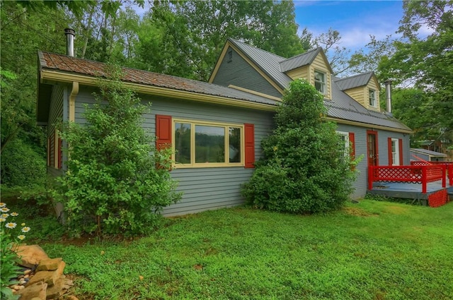 1405 Three Degree Rd, Adams Twp, PA 16059 - view of side of property with a yard, a metal roof, and a deck