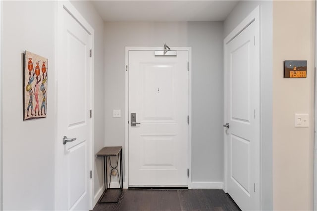 2545 Penn Ave Unit 208, Downtown Pgh, PA 15222 - doorway with baseboards and dark wood-style floors