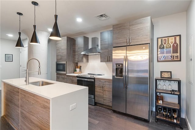 2545 Penn Ave Unit 208, Downtown Pgh, PA 15222 - kitchen with appliances with stainless steel finishes, wall chimney range hood, light countertops, modern cabinets, and recessed lighting