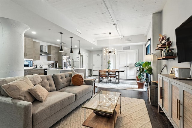 2545 Penn Ave Unit 208, Downtown Pgh, PA 15222 - living room with dark wood finished floors, a chandelier, and recessed lighting