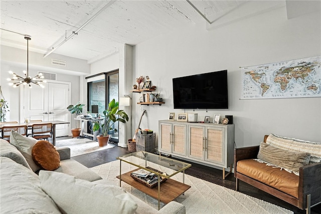 2545 Penn Ave Unit 208, Downtown Pgh, PA 15222 - living area with a chandelier and wood finished floors