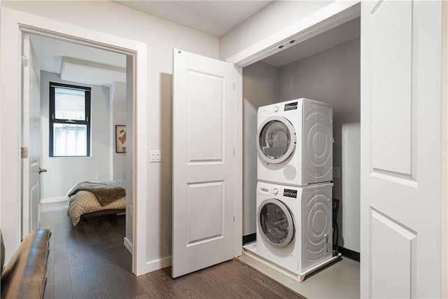 2545 Penn Ave Unit 208, Downtown Pgh, PA 15222 - laundry area with estacked washer and dryer and dark wood-type flooring