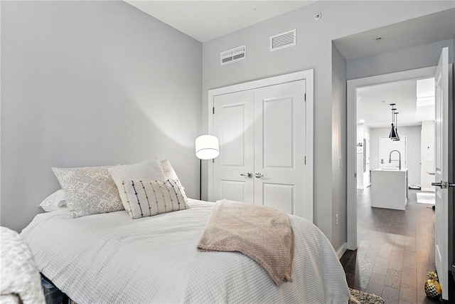 2545 Penn Ave Unit 208, Downtown Pgh, PA 15222 - bedroom with a closet and dark wood-style floors
