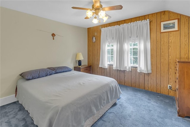 122 S Atlantic Ave, Cheswick, PA 15024 - carpeted bedroom with wood walls and a ceiling fan