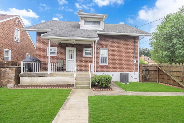 122 S Atlantic Ave, Cheswick, PA 15024 - bungalow with a shingled roof, brick siding, and covered porch