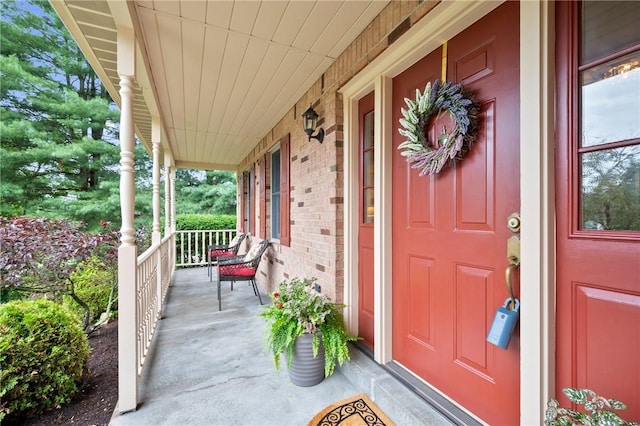 103 Cool Springs Ln, Penn Twp, PA 15636 - property entrance with covered porch and brick siding