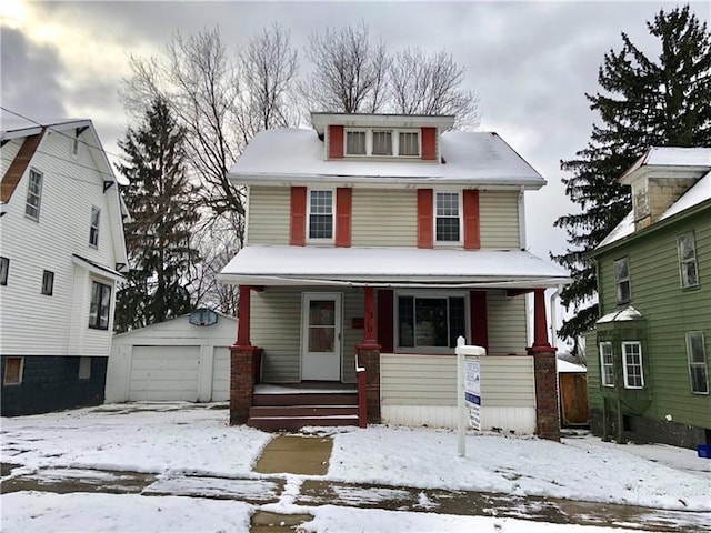 view of front of property with a porch and a garage