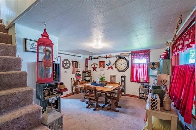 view of carpeted dining space