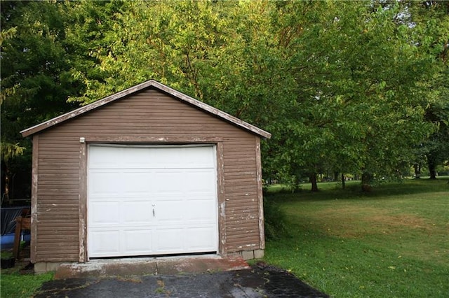 garage with a yard