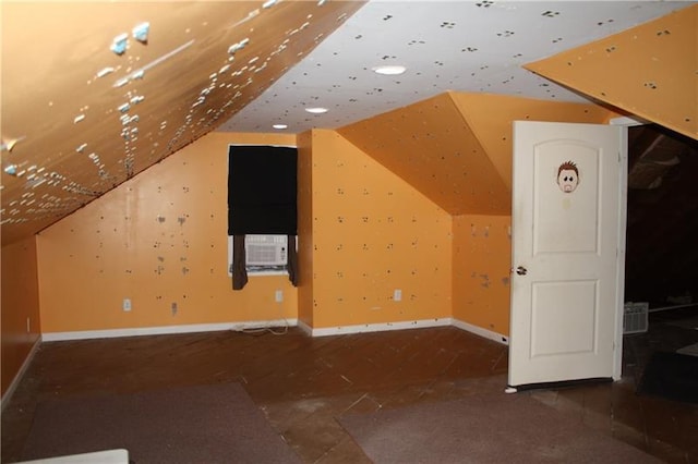 bonus room featuring lofted ceiling