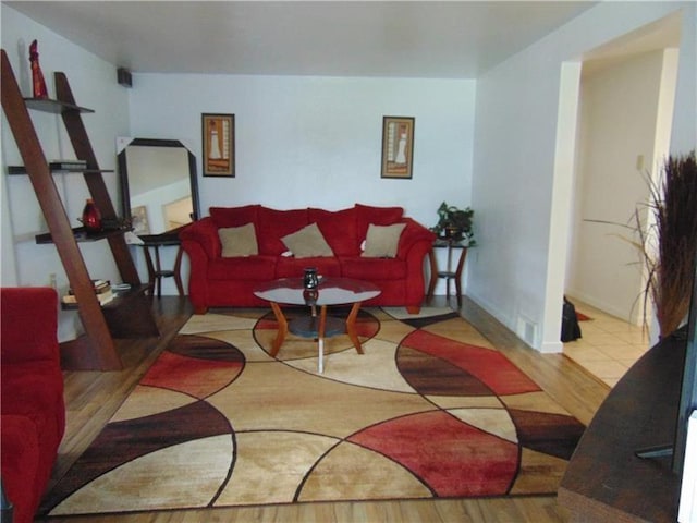 living room with light hardwood / wood-style flooring