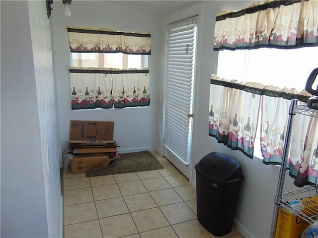 interior space featuring light tile floors