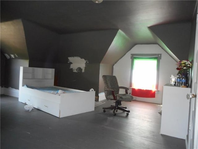 office area featuring dark hardwood / wood-style flooring and vaulted ceiling