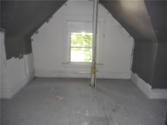 bonus room featuring lofted ceiling