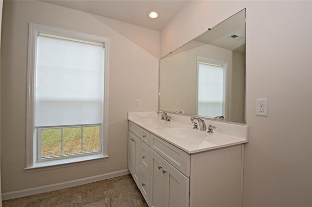 bathroom featuring vanity and tile floors