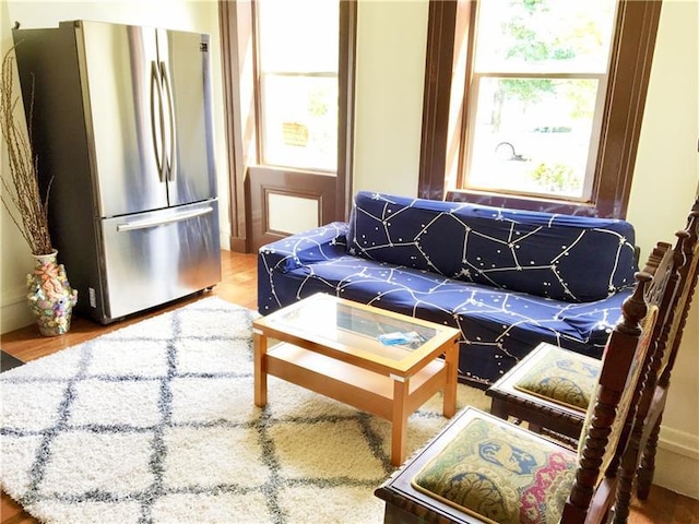 living room with light hardwood / wood-style floors