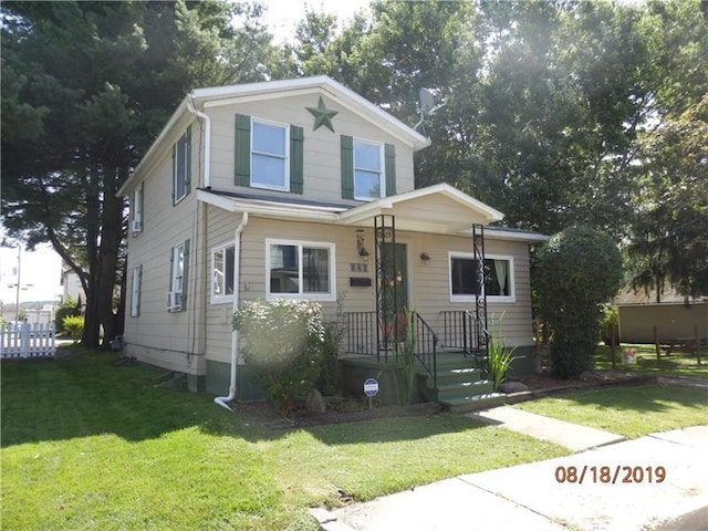 view of front of property with a front lawn