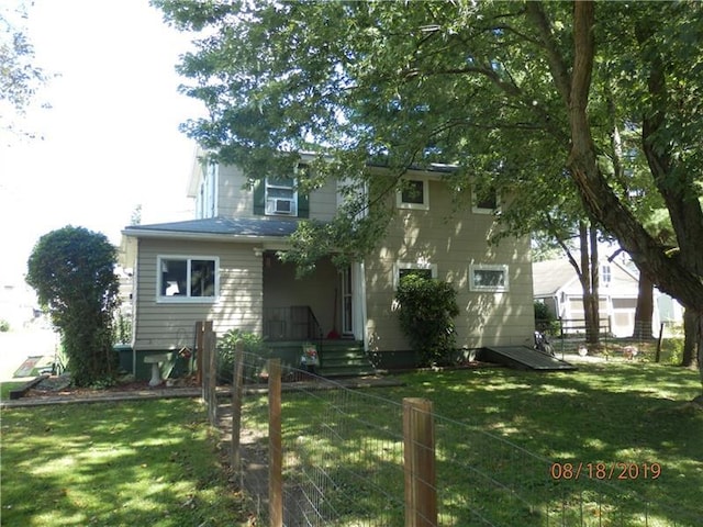 view of front of property with a front lawn