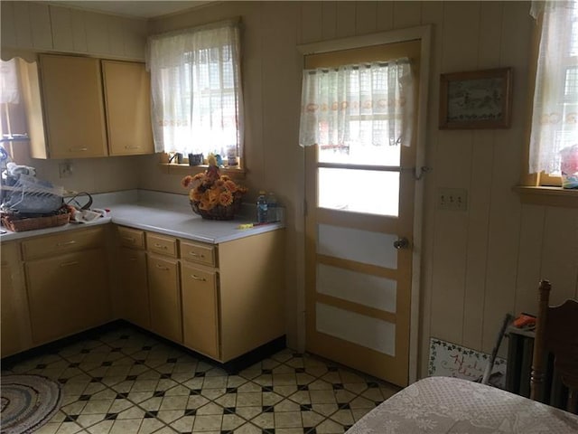 kitchen featuring cream cabinetry