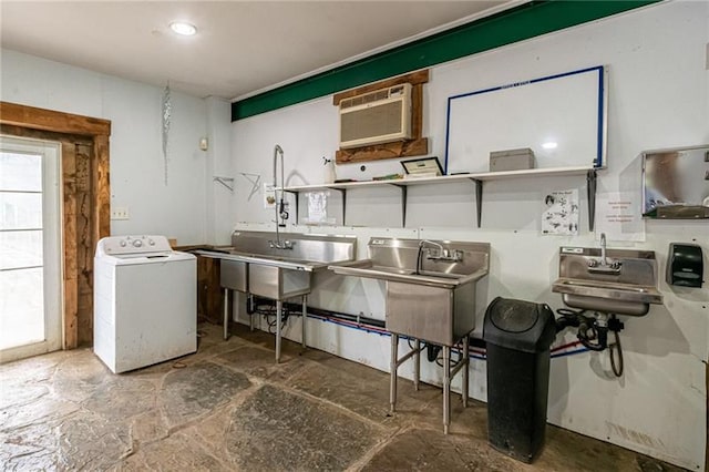 interior space featuring washer / dryer and a wall mounted air conditioner