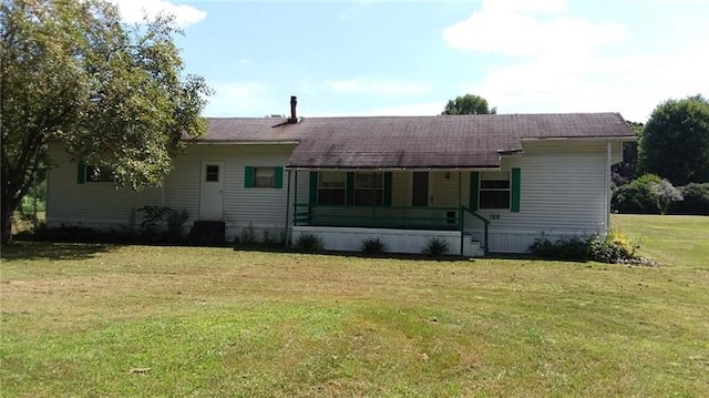 exterior space with a yard