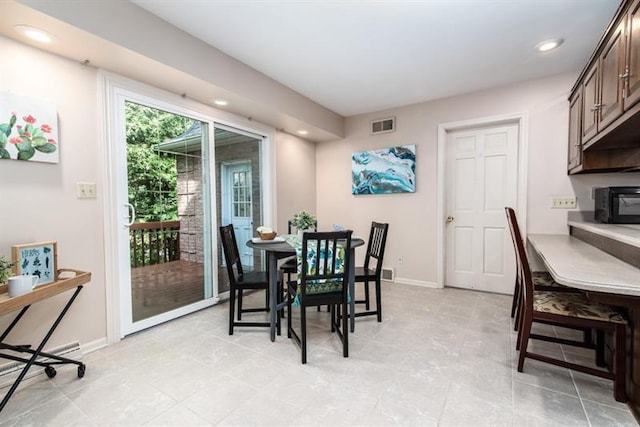 view of tiled dining space